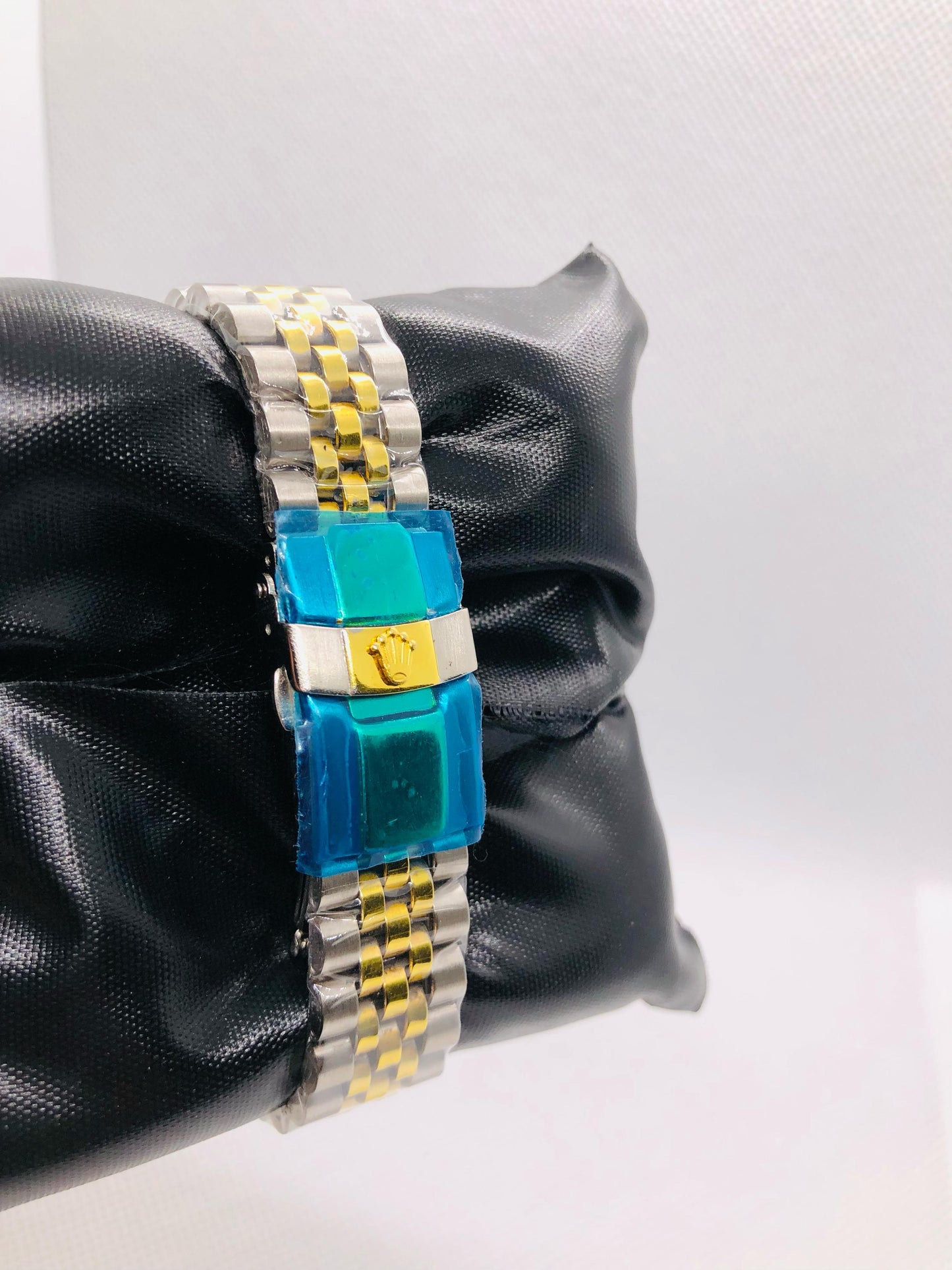 Rolex with Black and Golden Rotating Dila and Date