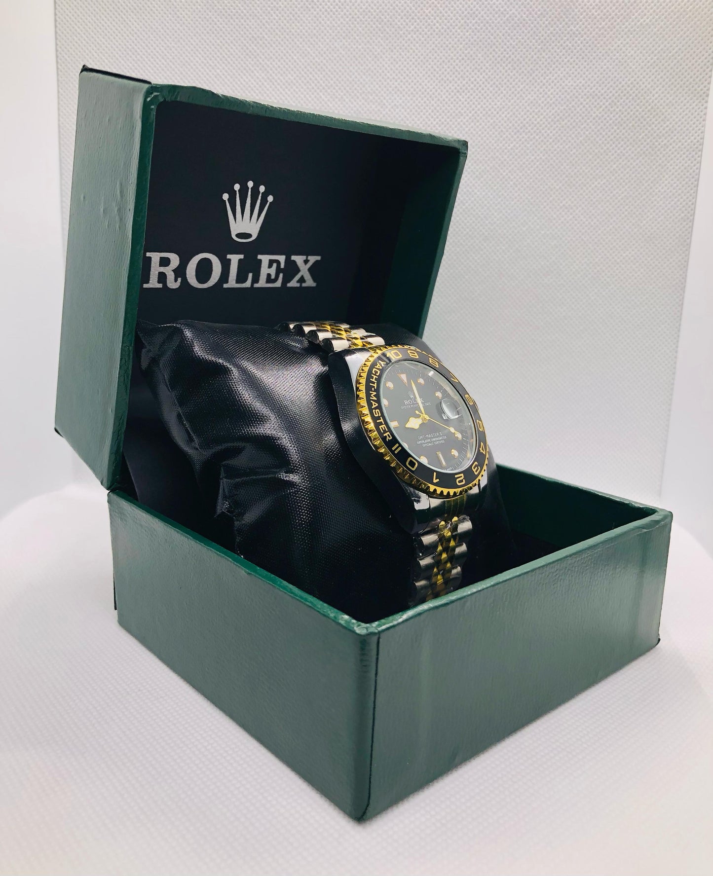 Rolex with Black and Golden Rotating Dila and Date